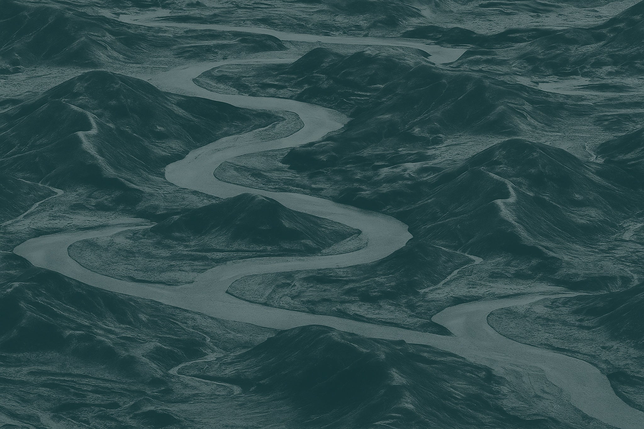 Winding river through a mountainous landscape